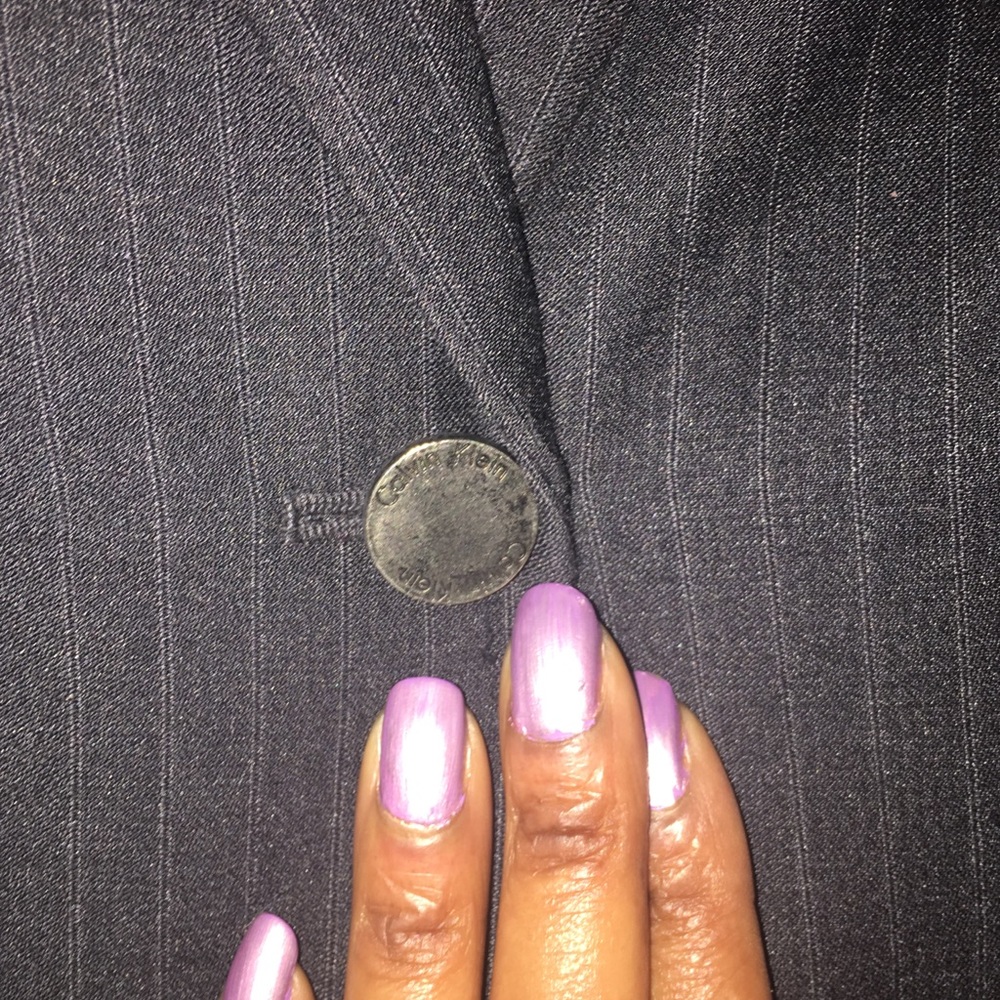 Calvin Klein 2pc. Pant suit. Grey w/lt. blue pin